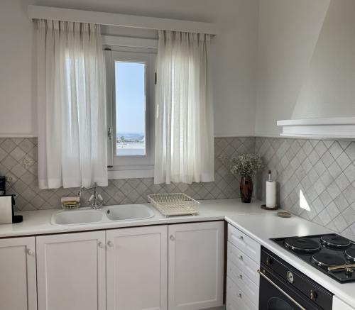 At the side of castle Milos | Ideal Vacations